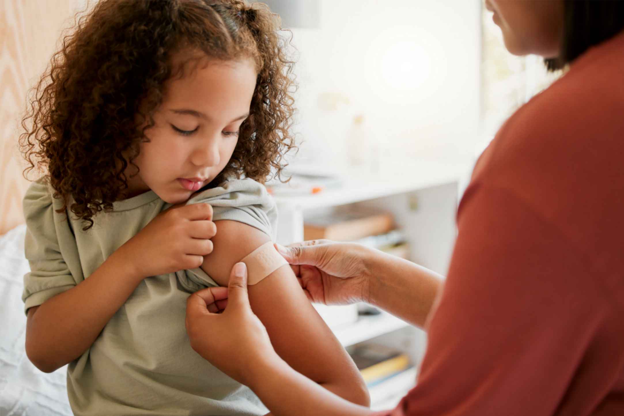 girl receiving vaccine