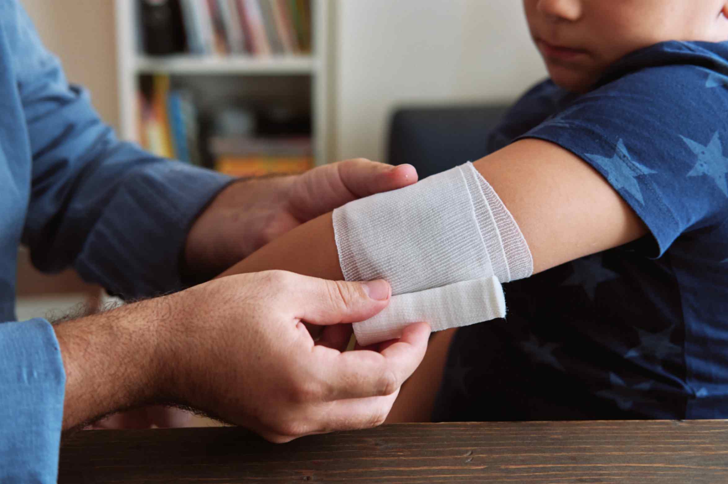 child being bandaged