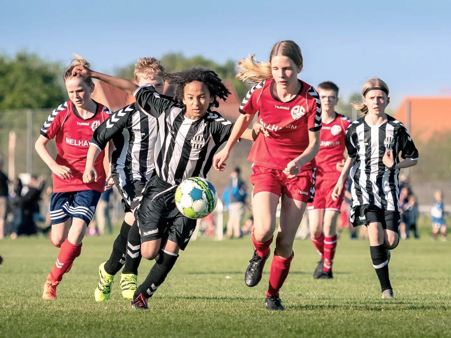 children playing soccer